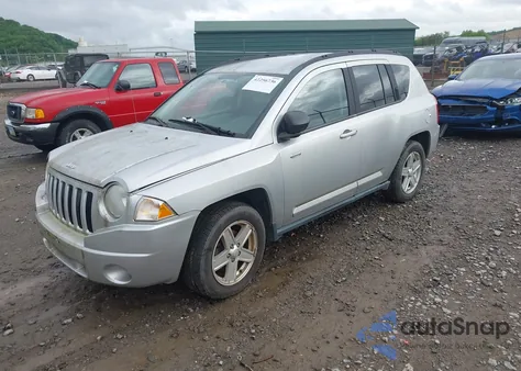 2010 Jeep Compass Sport from USA, damaged, VIN 1J4NT1FBXAD621049